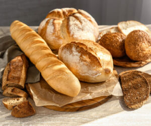 Assortment of fresh bread on table